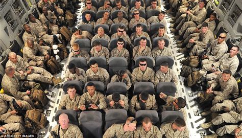 Room For One More Stunning Pictures Of U S Troops Crammed Into Military Plane As They Fly Out
