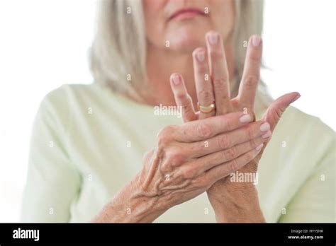 Senior Woman Rubbing Painful Hand Stock Photo Alamy