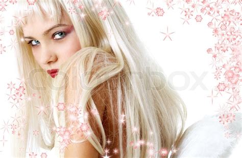 portrait of lovely blond with angel stock image colourbox