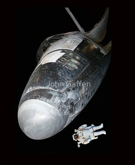 Nasas Orbiter Vehicle Atlantis With An Astronaut Performing An Eva