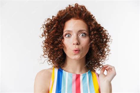 Premium Photo Portrait Of Amazed Redhead Curly Woman 20s Wearing Colorful Dress Smiling