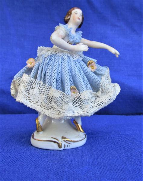 miniature lace figurine vintage collectable of a ballerina dancer manufactured by the dresden