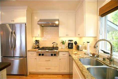 Cream colored kitchen cabinets with white appliances. cream kitchen cabinets with stainless steel appliances ...