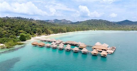 Download "escape To Paradise: Serene Beachfront Resort" Wallpaper