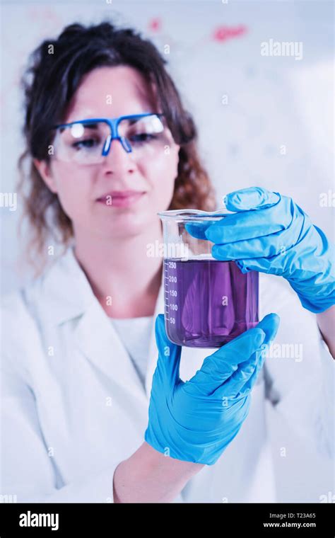 Young Female Scientist Doing Experiments In The Laboratory Stock Photo