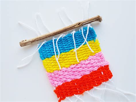 Weaving Concepts For Children Yarn Weaving On A Cardboard Loom Do A