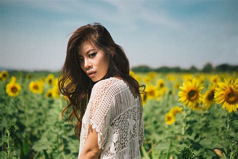 Woman In The Sunflower Field By Stocksy Contributor Marija Savic Stocksy