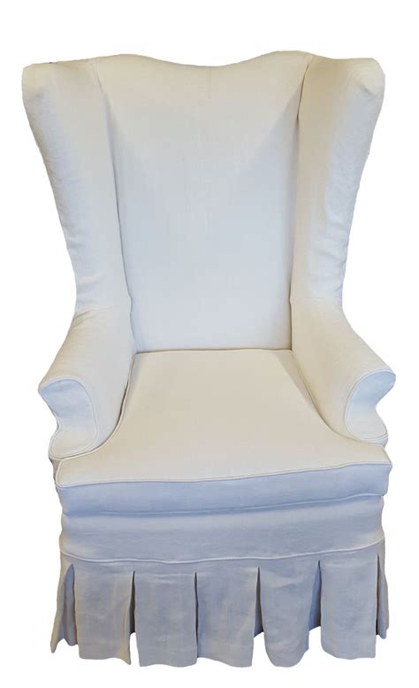 This piece features clean lines that offer a modern twist on furniture design. Wing Chair Slip Cover. Reupholstered in muslin with slip ...
