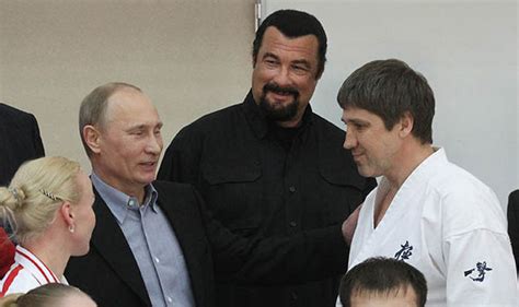 Vladimir Putin Hands Steven Seagal Russian Passport Amidst Improving Us Relations World