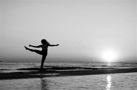 Girl Doing Gymnastics On The Beach At Sunset Stock Image Image Of