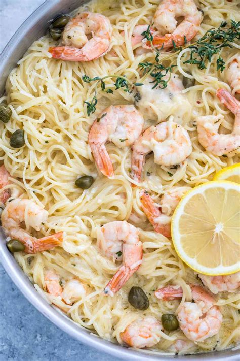 While the pasta cooks, fry the bacon, then sauté the shrimp in the rendered fat along with the scallions and garlic. Creamy Garlic Shrimp Pasta Recipe VIDEO - Sweet and ...
