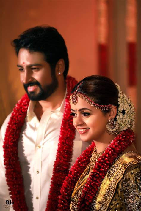 Shopzters The Celebrity Wedding Of Actress Bhavana With Producer Naveen Bridal Hairstyle