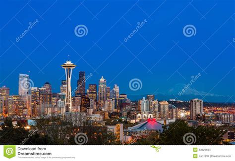 Seattle Downtown Skyline And Mt Rainier At Night Wa Stock Photo