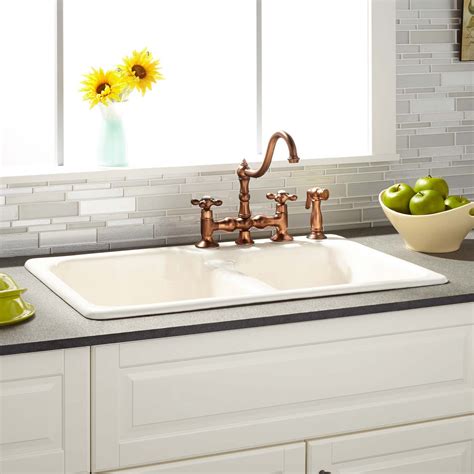 Most stainless steel sinks are sound deafening, to reduce the. 33" Elgin 60/40 Bisque Double-Bowl Cast Iron Drop-in ...