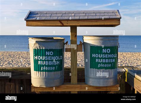 Trash Cans Placed Along The Beach To Discourage Littering As Well As