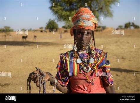 Fulani Women Gathering Water From A Hole In The Sahel Burkina Faso