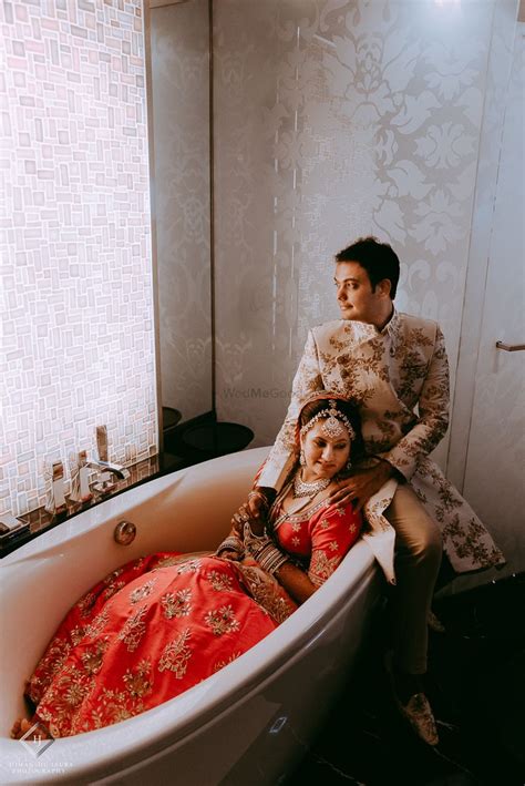 Photo Of Couple Bathtub Getting Ready Shot
