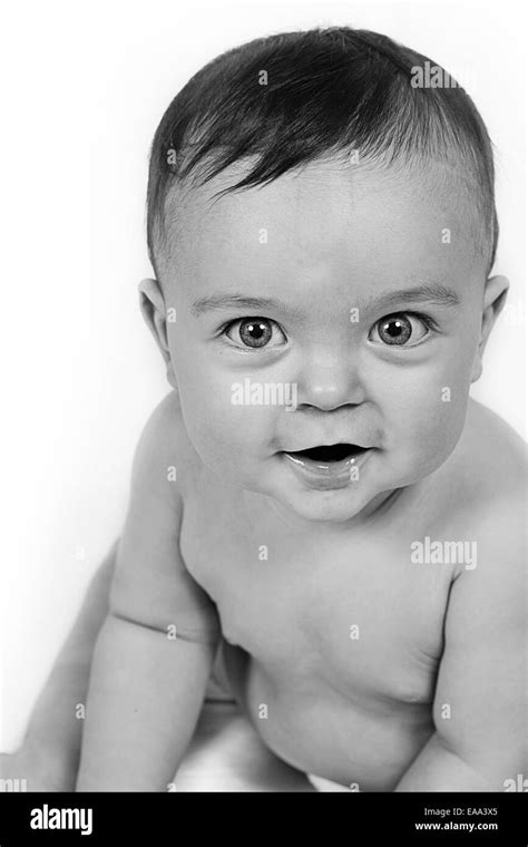 Cute Little Baby Boy Posing For Camera Stock Photo Alamy