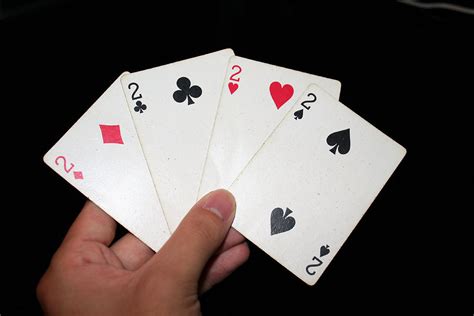 Cards Free Stock Photo A Hand Holding The Four Twos In A Standard