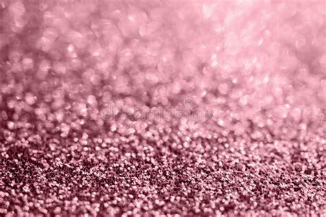 Abstract Rose Gold Glitter Sparkle Texture With Bokeh Background Stock