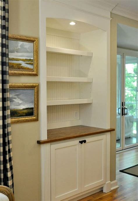 Building and painting kitchen cabinets. From Door To Built In Cabinet Transformation | Hometalk