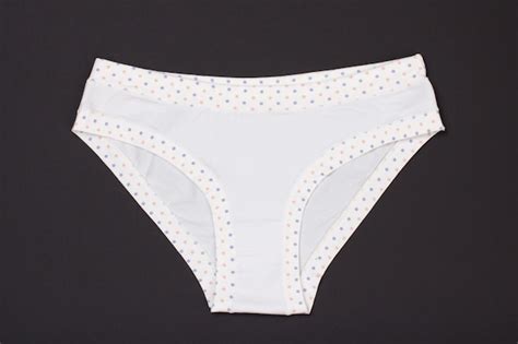 Premium Photo White Cotton Panties On Black Background Woman Underwear Top View