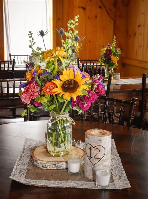 We Love These Country Wildflower Centerpieces Featuring Sunflowers