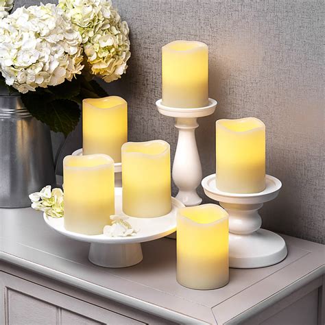 Flameless Candles Pillar Candles Ivory 3x4 Melted