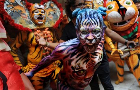 Indian Dancers Paint Their Body Like Tigers As They Perform A Tiger