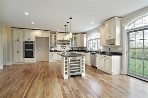 Dramatic white paneling, dark chevron floors and. 36 "Brand New" All White Kitchen Layouts & Designs (Photos)