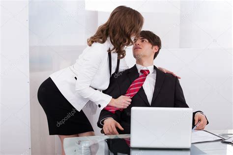 Sensuous Secretary Seducing Boss At Desk Stock Photo Andreypopov