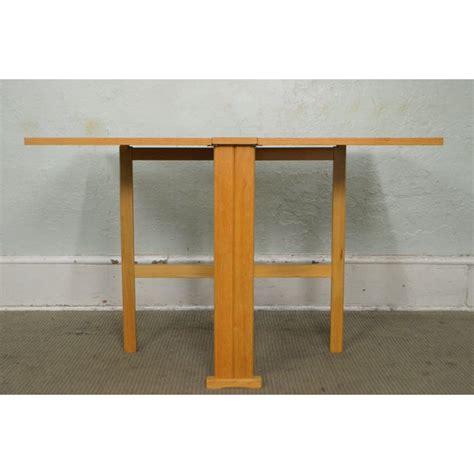 Mid Century Modern Narrow Drop Leaf Dining Table | Chairish With the drop leaf table, small space dining is a snap!