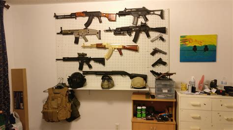 finally got my airsoft wall and gear shelf set up r airsoft