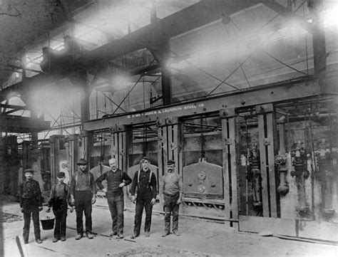 A Crew Of Steel Workers In Front Of An Open Hearth At Jones And Laughlin