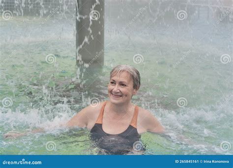 mature woman in outdoor thermal pool stock image image of shower mature 265845161