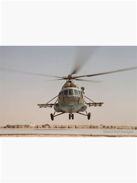 An Afghan Air Force Russian Mil Mi 17 Helicopter Takes Off From Camp