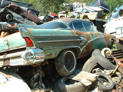 1958 Buick Sitting On Top Of A Pile Of Cars In Junk Yard 8 X 10