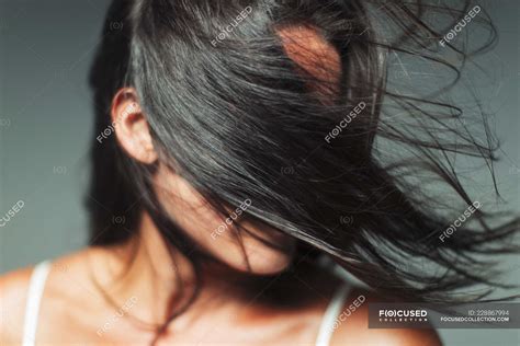 Wind Blowing Hair In Womans Face — Studio Shot 35 39 Years Stock