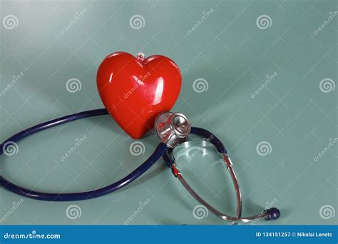 Red Heart And A Stethoscope On Desk Stock Image Image Of Love Clinic