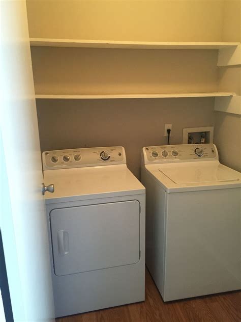 Full size washer and dryer connections in the laundry room our of B1