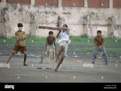 Several Boys Playing Cricket In India Stock Photo Alamy
