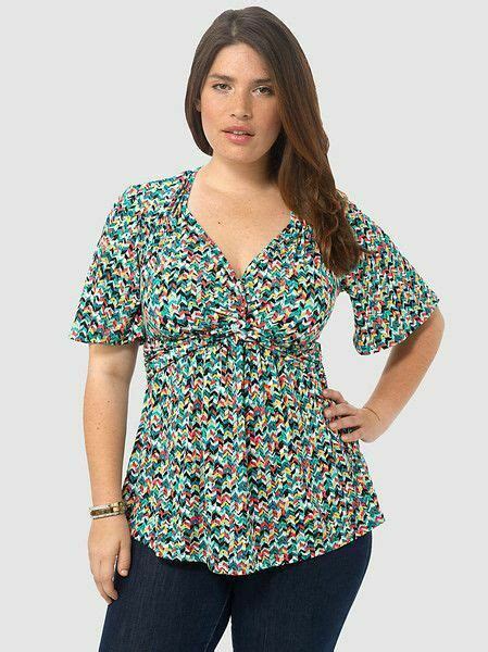 This ️ Plus Size Empire Waist Top Has Flattering Flutter Sleeves ️