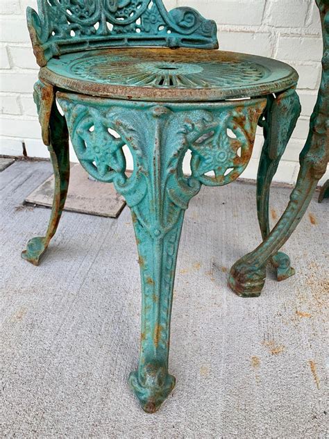 Wrought iron bistro table designs are meant to fit into small spaces, making every dining experience an intimate one. Antique Green Cast Iron Outdoor Bistro Set, Table and Two ...