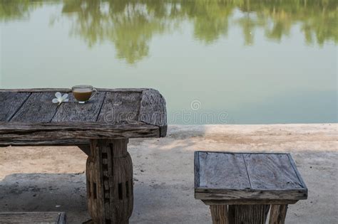 Morning Coffee On The Table Beside The Water Stock Image Image Of