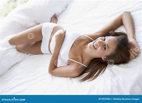 Woman Lying In Bed Stock Photo Image Of Indoors Brunette