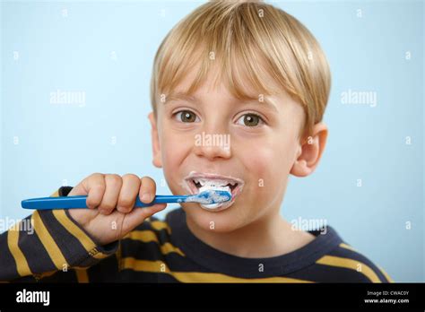 Boy Brushing Teeth Stock Photo Alamy