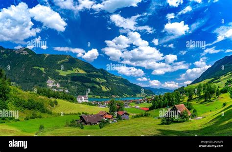 Panorama Of Swiss Village Lungern With Church And Traditional Wood