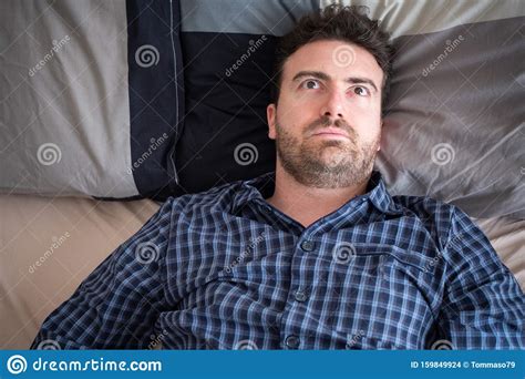 Man Having Problem Sleeping In His Bed Stock Photo Image Of Napping