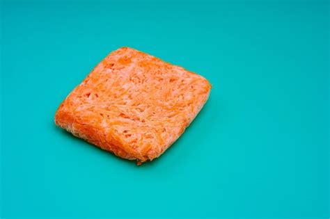 Premium Photo Orange Bricks Of Frozen Grated Carrots Procurement Of