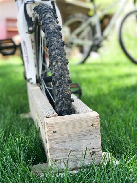 This diy bike rack design is a bit on the bulky side compared to others but it only takes a few minutes to put it all together which makes up for everything you can get pretty creative with your diy bike rack designs and try to create hybrids like this one from instructables. Easy DIY Bike Rack | 10 Minute DIY - Twelve On Main